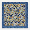 View 1 of product The Blue and Yellow Paisley Tiger Silk Pocket Square by Turnbull & Asser features a light blue base with paisley, elephants, tigers, and floral motifs—highlighted by a blue border. An elegant choice to pair with any Turnbull shirt.