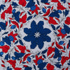 View 3 of product The Blue and Red Foliage Pattern Silk Pocket Square by Turnbull & Asser features intricate symmetrical leaves and flowers in red, blue, and navy on a light grey silk background, creating an elegant circular motif.