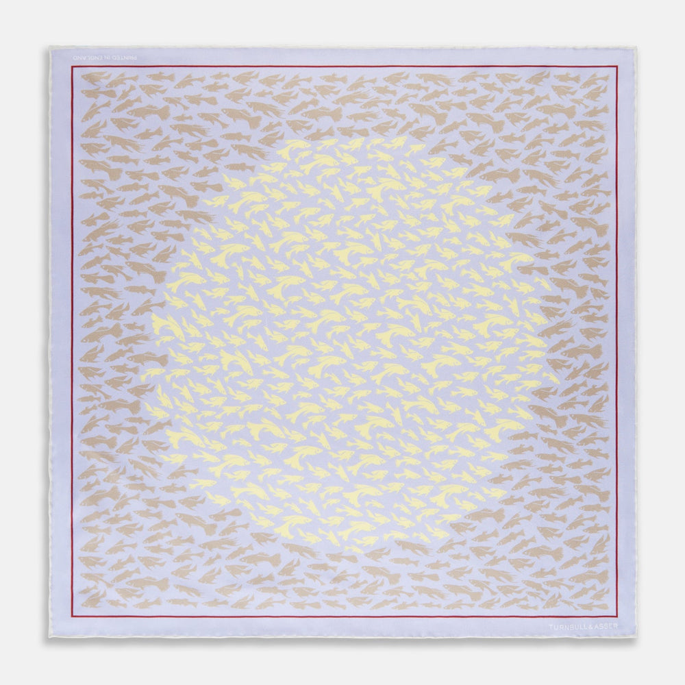 Turnbull & Asser’s Pale Blue and Lemon Fish Mosaic Silk Pocket Square features beige fish silhouettes forming a dense border around a white and yellow center, inspired by Mediterranean mosaics—ideal for adding artistic flair to your attire.