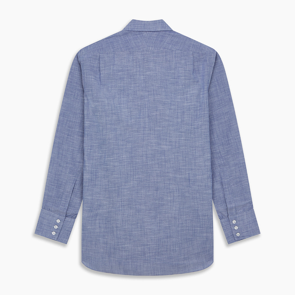 The Turnbull & Asser Blue Chambray Cotton Regular Fit Mayfair Shirt features a subtle textured pattern, pointed T&A collar, and white buttons. Shown here in a light blue shade, laid flat on a white background.