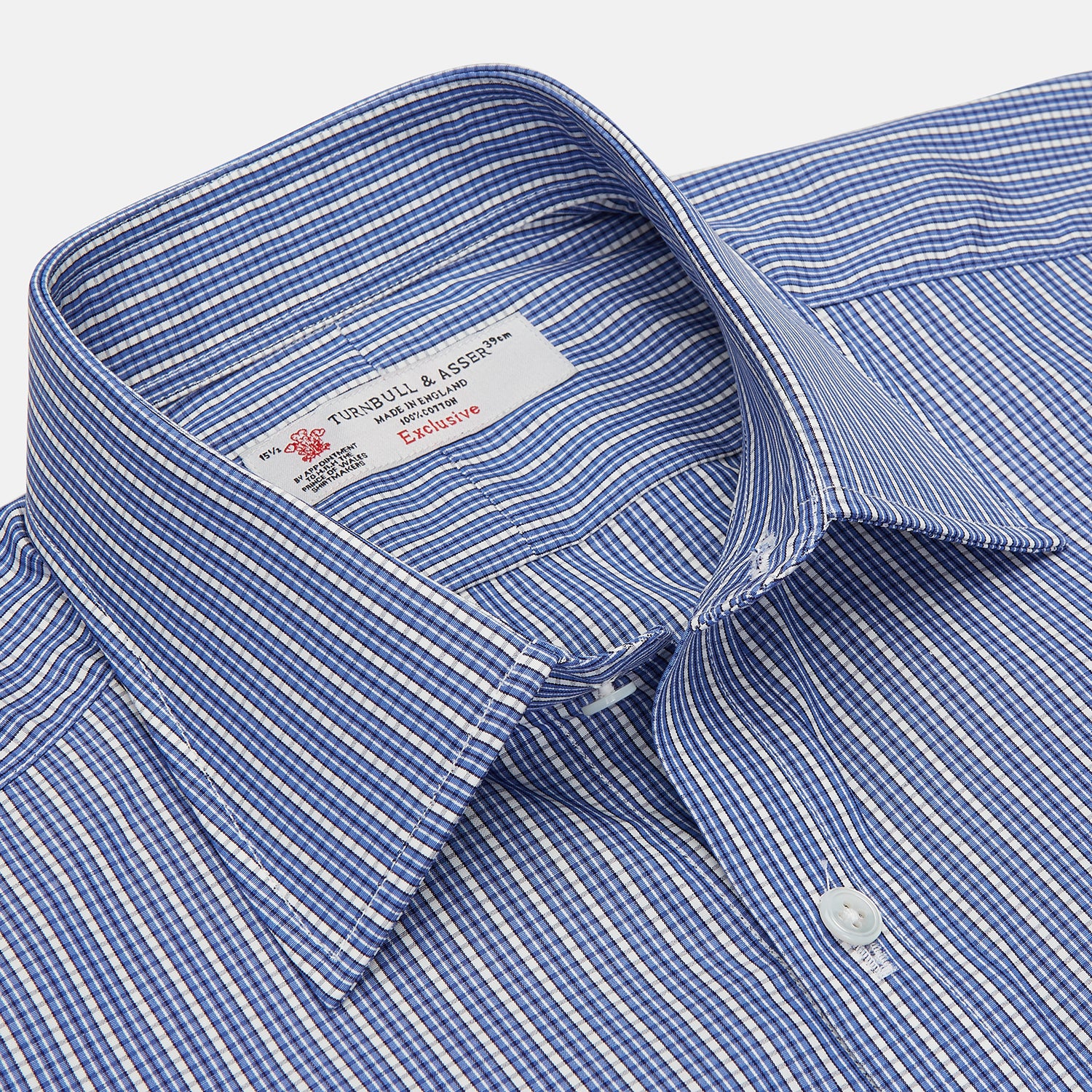 View 3 of product The Turnbull & Asser Navy Rich Check Shirt features a T&A collar, 3-button cuffs, and a checked pattern, shown laid flat on a white background.