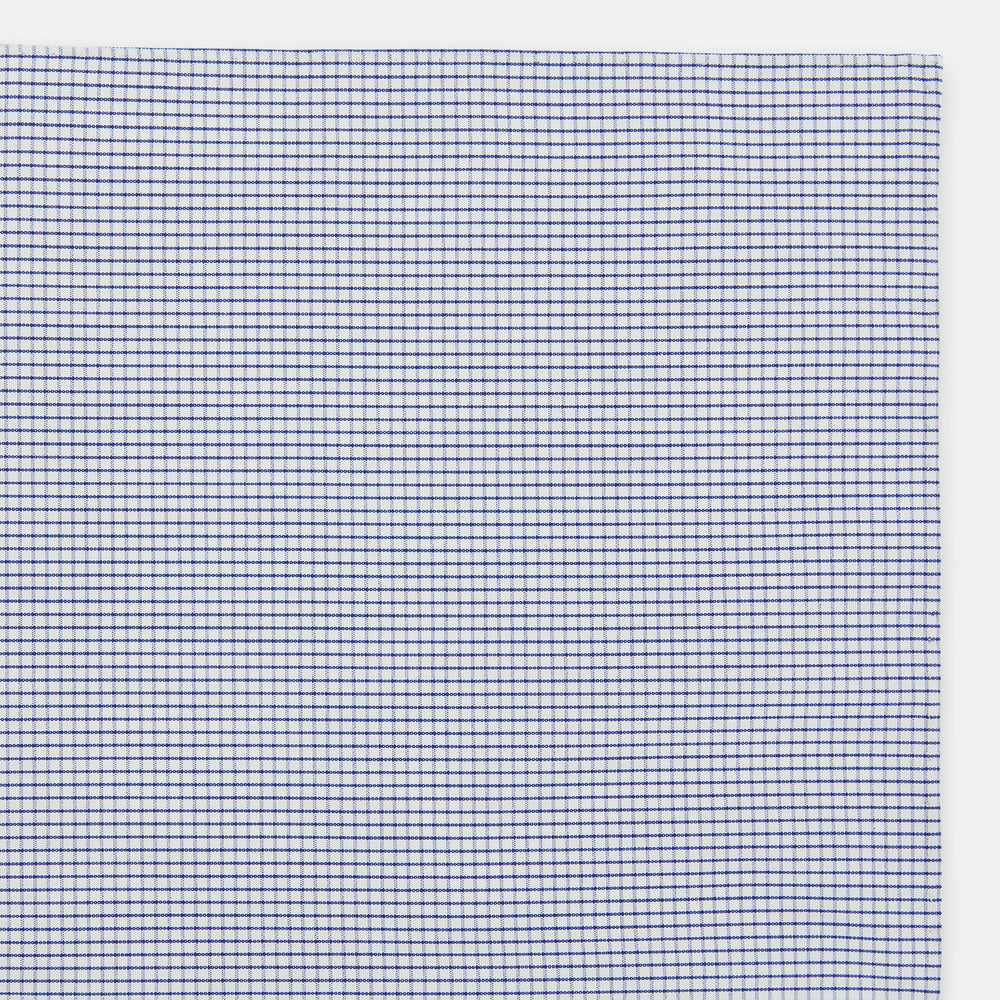 The Turnbull & Asser Hand Rolled Navy Graph Check Handkerchief features evenly spaced navy lines forming a classic grid, offering a clean and timeless look in premium cotton.