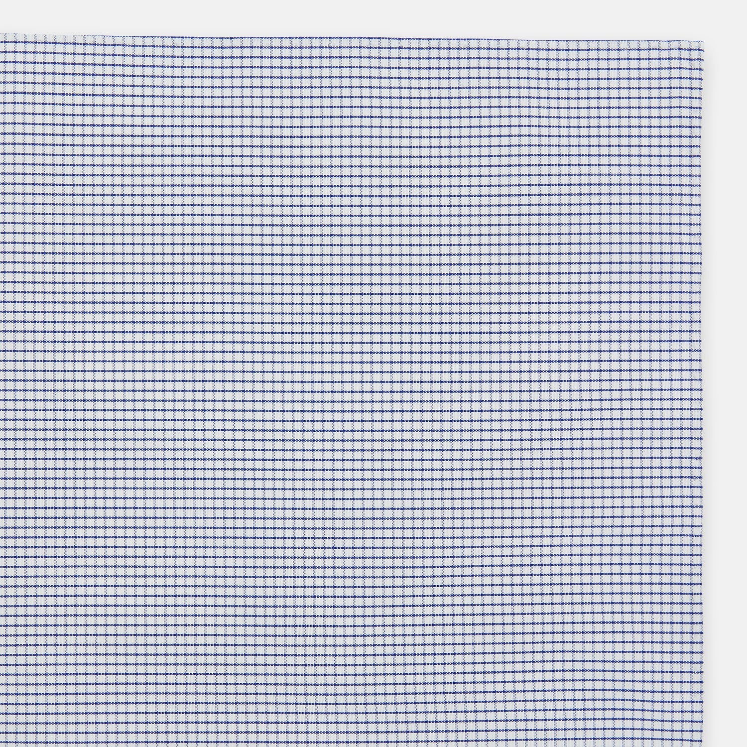 View 2 of product The Turnbull & Asser Hand Rolled Navy Graph Check Handkerchief features evenly spaced navy lines forming a classic grid, offering a clean and timeless look in premium cotton.