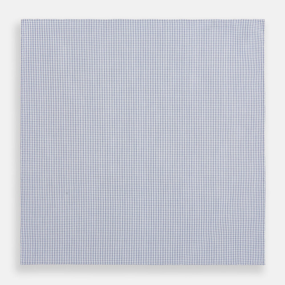 The Turnbull & Asser Hand Rolled Navy Graph Check Handkerchief features evenly spaced navy lines forming a classic grid, offering a clean and timeless look in premium cotton.