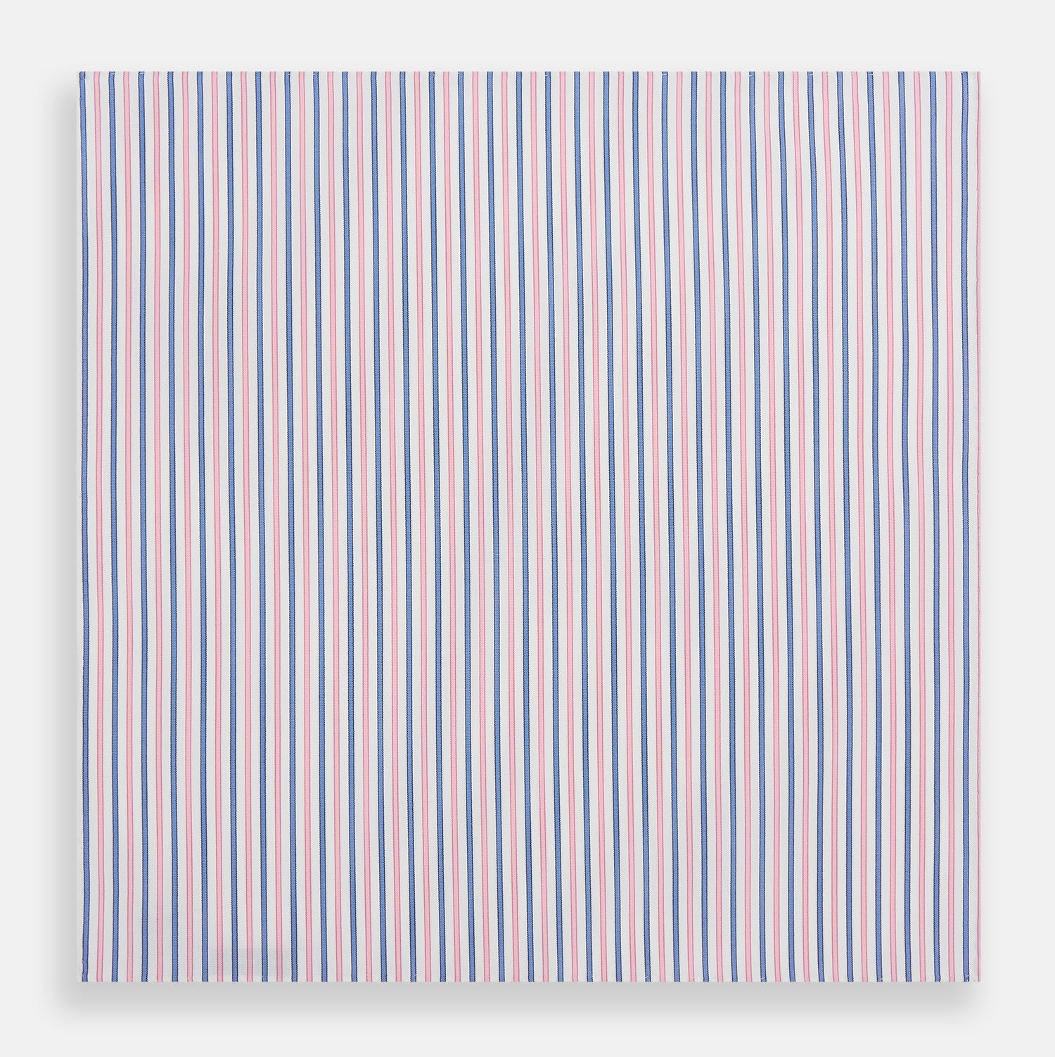 View 3 of product The Turnbull & Asser Hand Rolled Pink and Blue Track Stripe Handkerchief is a cotton square with blue, pink, and purple stripes on white, finished with a hand-rolled pink edge—an elegant addition to formal attire.