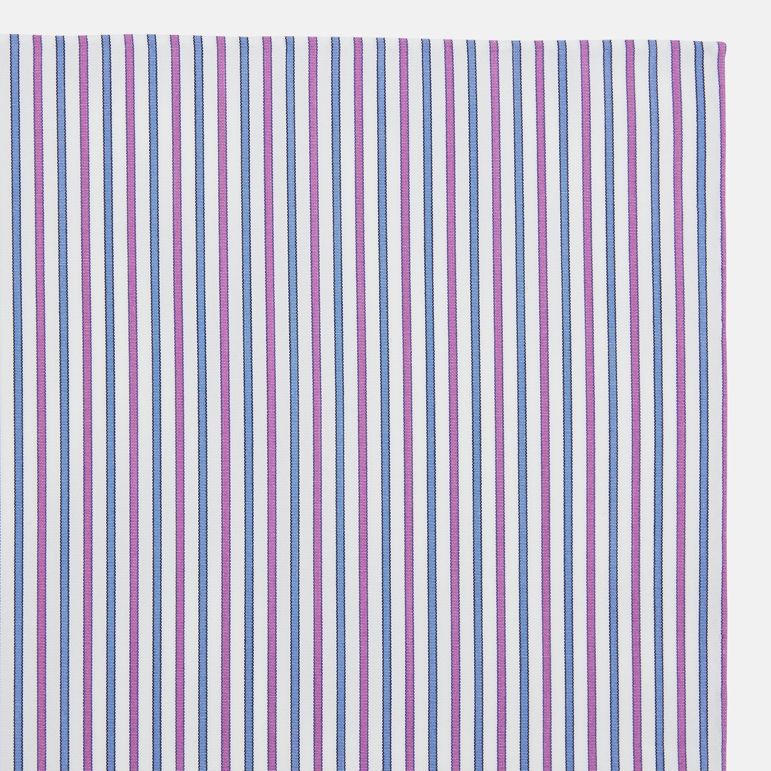 View 2 of product The Turnbull & Asser Hand Rolled Purple and Blue Track Stripe Handkerchief features alternating blue and purple stripes on white cotton—an elegant formal accessory displayed on a plain white background.