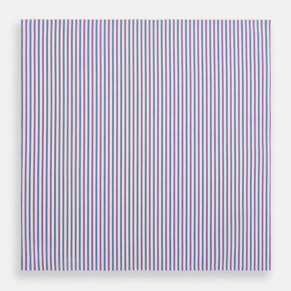 The Turnbull & Asser Hand Rolled Purple and Blue Track Stripe Handkerchief features alternating blue and purple stripes on white cotton—an elegant formal accessory displayed on a plain white background.