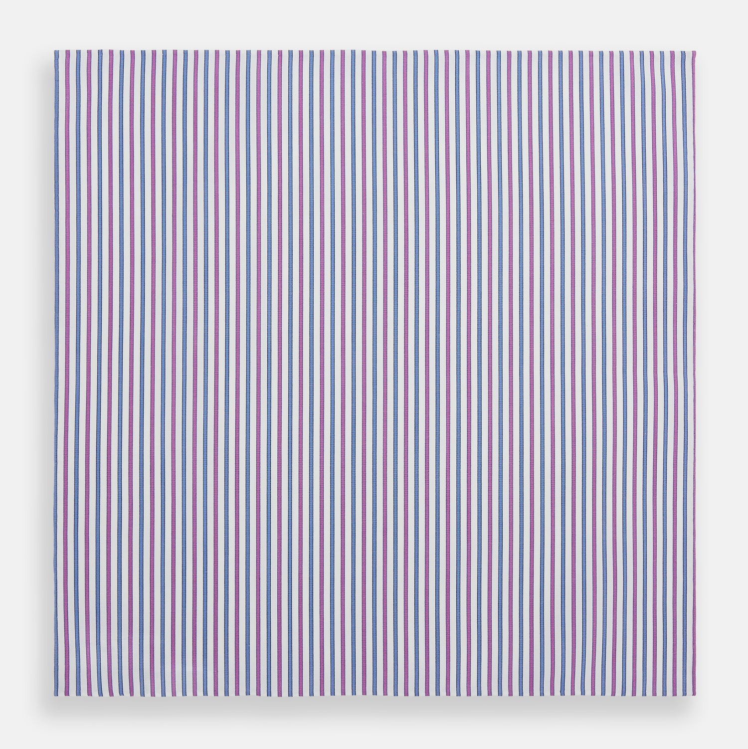 View 3 of product The Turnbull & Asser Hand Rolled Purple and Blue Track Stripe Handkerchief features alternating blue and purple stripes on white cotton—an elegant formal accessory displayed on a plain white background.