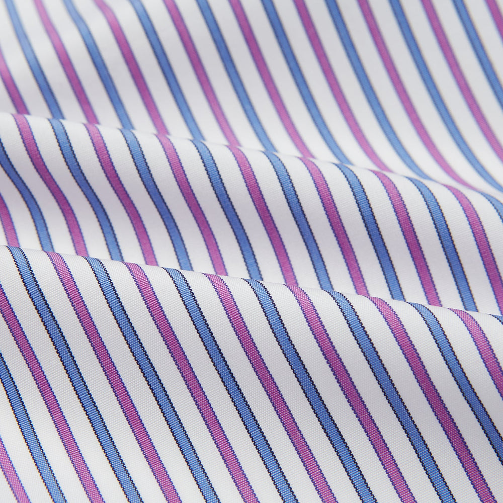 The Turnbull & Asser Hand Rolled Purple and Blue Track Stripe Handkerchief features alternating blue and purple stripes on white cotton—an elegant formal accessory displayed on a plain white background.