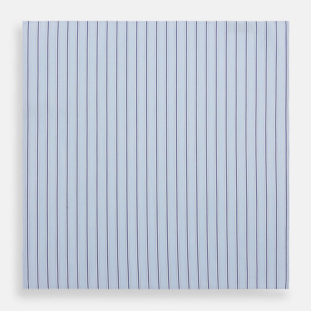 The Turnbull & Asser Hand Rolled Blue Multi Stripe Handkerchief features evenly spaced thin navy stripes—a stylish formal accessory for any occasion.