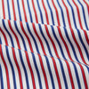 View 4 of product The Hand Rolled Red and Blue Track Stripe Handkerchief by Turnbull & Asser features vertical red, blue, and white stripes—a refined cotton accessory with a visible seam, ideal for formal occasions.