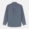 View 5 of product The Turnbull & Asser Blue Chambray Weekend Fit Nevis Cotton Shirt features a Dorset collar, 1-button cuffs, and smart-casual tailoring, shown laid flat on a white background.
