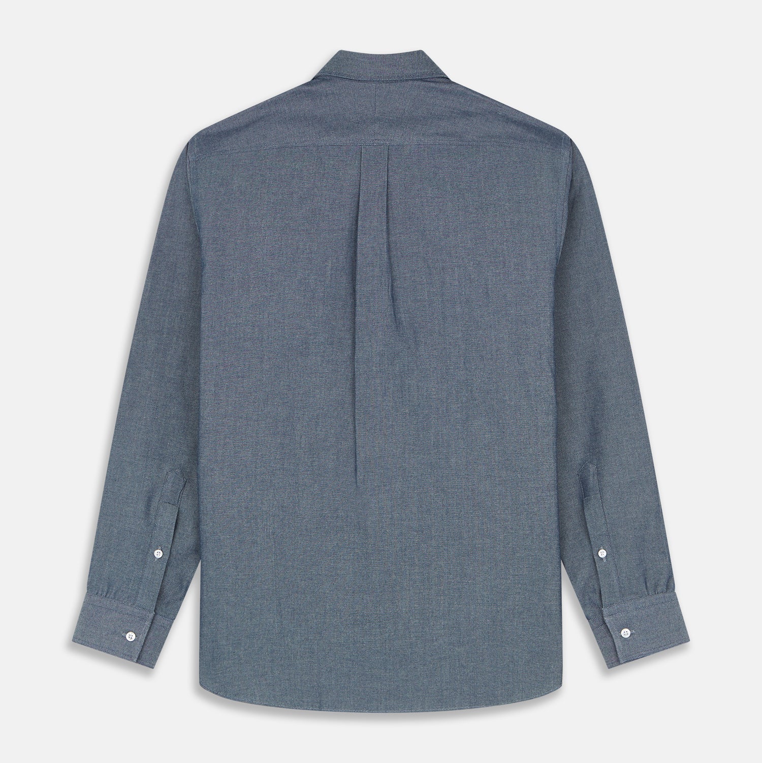 View 5 of product The Turnbull & Asser Blue Chambray Weekend Fit Nevis Cotton Shirt features a Dorset collar, 1-button cuffs, and smart-casual tailoring, shown laid flat on a white background.