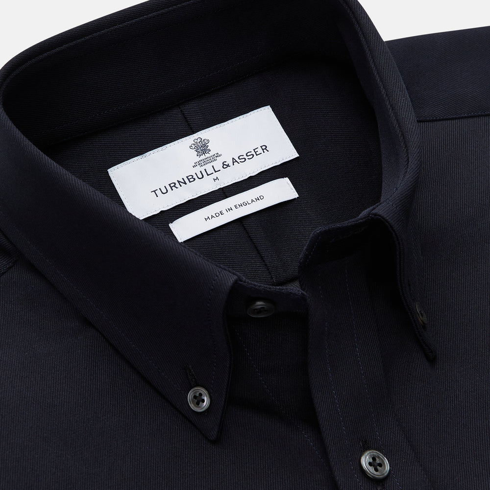 The Turnbull & Asser Navy Weekend Fit Hayne Shirt features a Dorset collar and 1-button cuffs, offering an elevated casual look as part of our Weekend Fit shirts collection.
