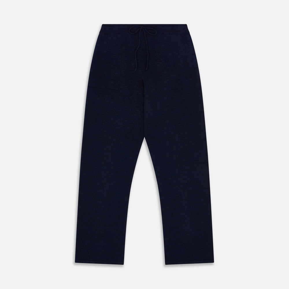 The Turnbull & Asser Navy Cashmere Knitted Traditional Pyjama Set features a long-sleeve camp collar shirt with front pockets and matching drawstring pants, offering an elevated twist on classic loungewear.