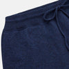 View 3 of product The Turnbull & Asser Navy Cashmere Knitted Traditional Pyjama Set features a long-sleeve camp collar shirt with front pockets and matching drawstring pants, offering an elevated twist on classic loungewear.