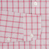 View 3 of product The Pink Graph Overlay Check Piccadilly Shirt by Turnbull & Asser features long sleeves, a button-up front, collar, and chest pockets—a stylish cotton option in a red and white check pattern for the holidays.