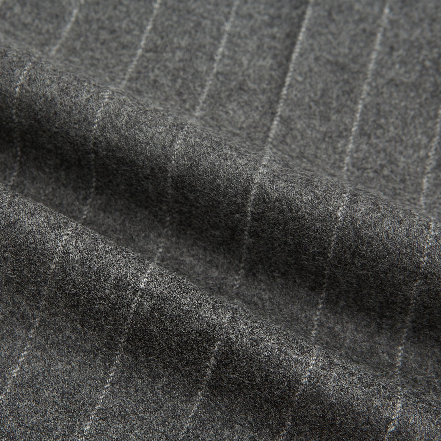 View 6 of product The Turnbull & Asser Grey Pinstripe Henry Trousers feature a tailored fit, white vertical stripes, button closure, and belt loops, displayed on a plain white background.