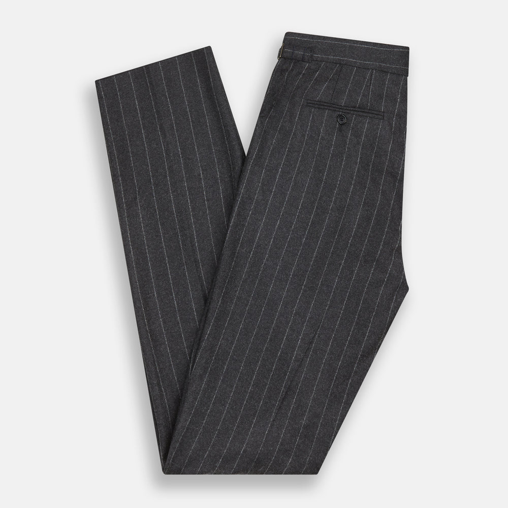 The Charcoal Pinstripe Henry Trousers by Turnbull & Asser feature white vertical stripes, a button and zip closure, belt loops, and side pockets, shown against a plain white background.