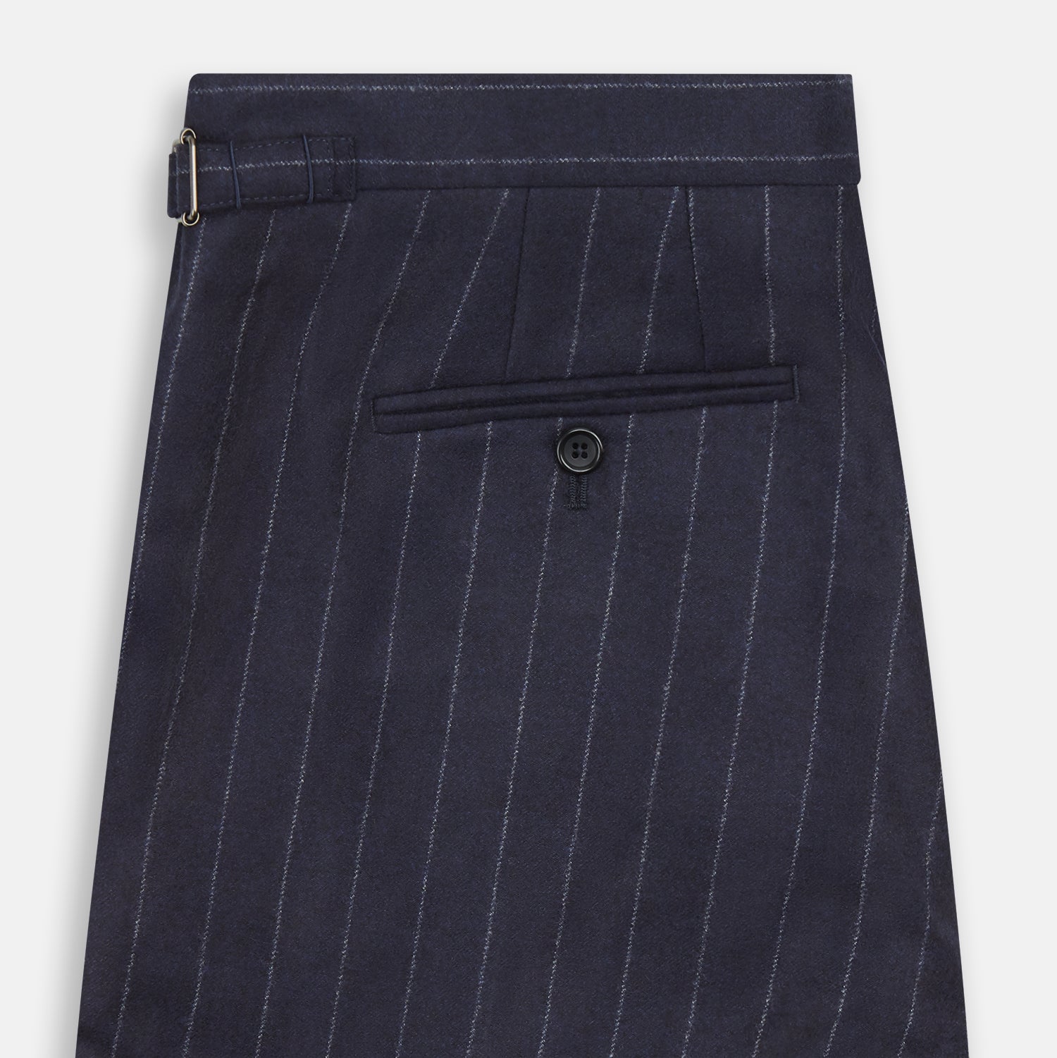 View 4 of product The Navy Pinstripe Henry Trousers by Turnbull & Asser feature vertical white stripes, a tailored fit, button closure, and belt loops. Crafted from a wool cashmere blend, they are shown against a plain white background.