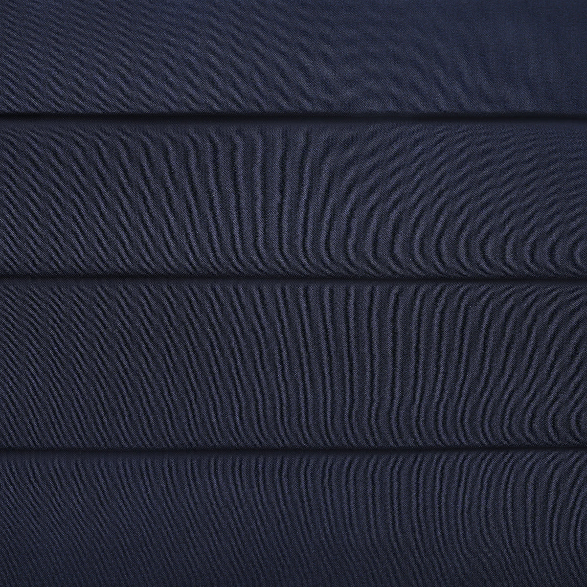 View 4 of product The Turnbull & Asser UK Casino Royale Midnight Blue Cummerbund in silk, featuring elegant horizontal pleats and showcased flat on a white background, is a sophisticated accessory crafted to enhance any formal evening attire.