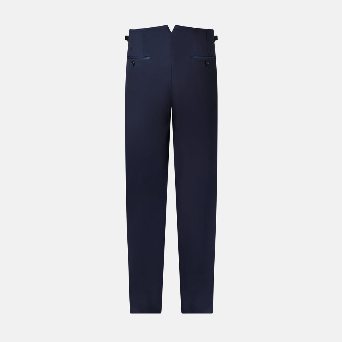 View 3 of product The Casino Royale Midnight Blue Tuxedo Trousers in Wool by Turnbull & Asser UK are shown from the back, expertly crafted from virgin wool in a signature tuxedo style, featuring two buttoned back pockets and adjustable side tabs at the waistband.