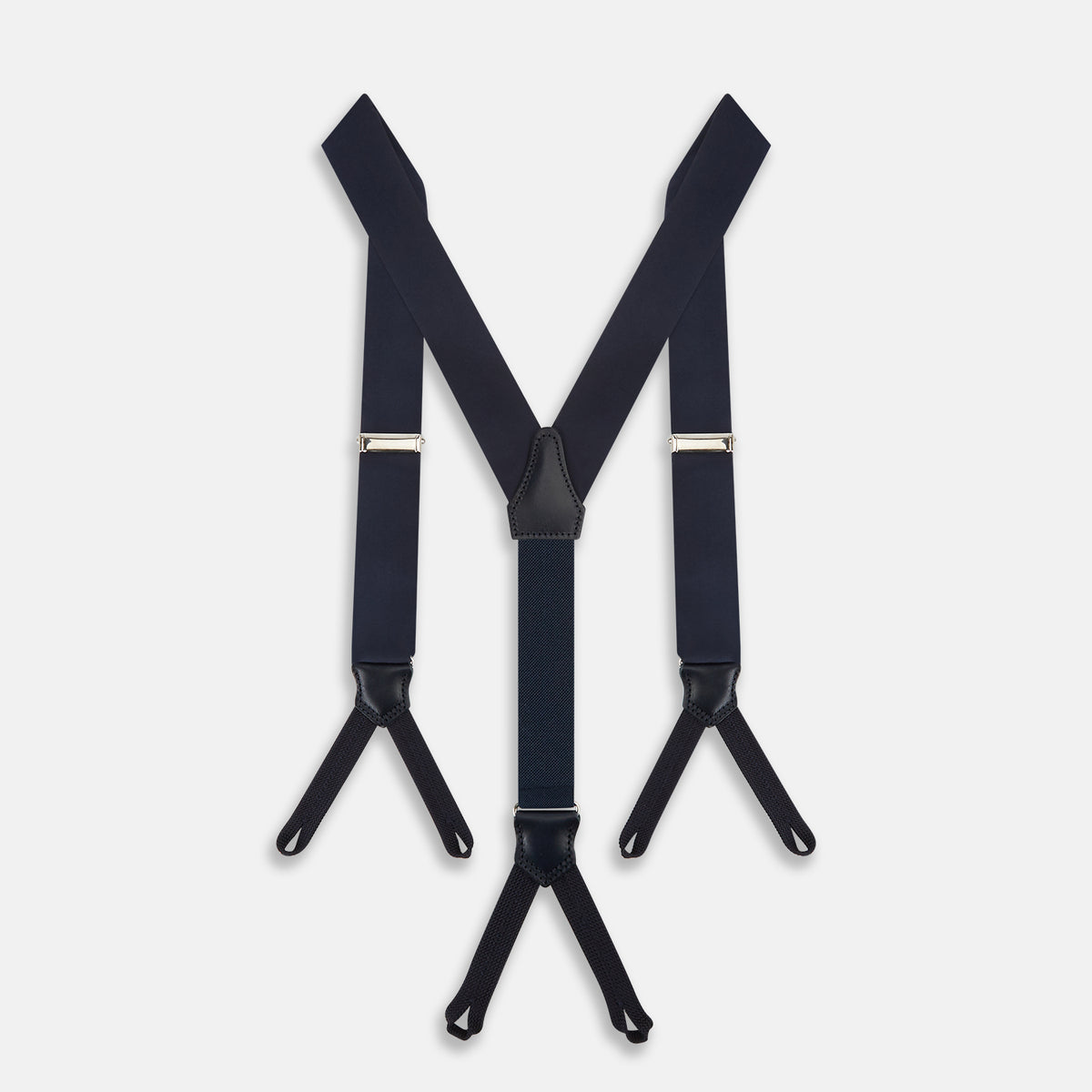 View 1 of product The Turnbull & Asser UK Casino Royale Midnight Blue Braces in Silk, featuring leather and elastic looped ends inspired by the iconic Casino Royale style, are displayed vertically against a white background—a sophisticated accessory for formal eveningwear.
