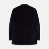 View 4 of product The Turnbull & Asser Navy Velvet Jacket features a classic fit, single-breasted style, notched lapels, two flap pockets, chest pocket, and single button closure. Made in Italy; shown on a plain white background.
