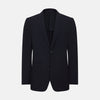 View 1 of product The Navy Knitted London Blazer by Turnbull & Asser features notch lapels, two buttons, and three front pockets—ideal for spring or summer contemporary looks. Displayed on a plain white background.
