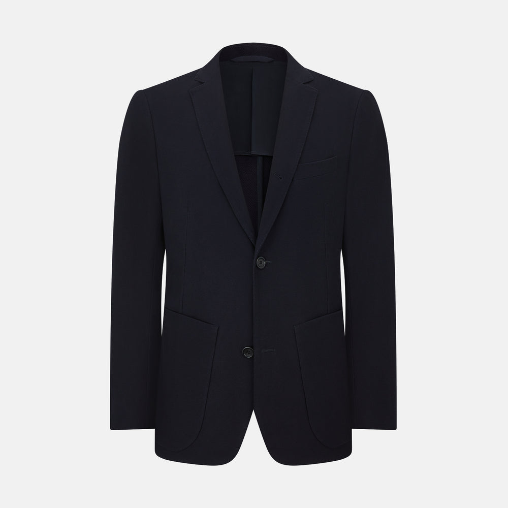 The Navy Knitted London Blazer by Turnbull & Asser features notch lapels, two buttons, and three front pockets—ideal for spring or summer contemporary looks. Displayed on a plain white background.