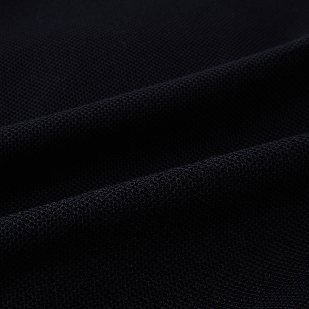 The Navy Knitted London Blazer by Turnbull & Asser features notch lapels, two buttons, and three front pockets—ideal for spring or summer contemporary looks. Displayed on a plain white background.