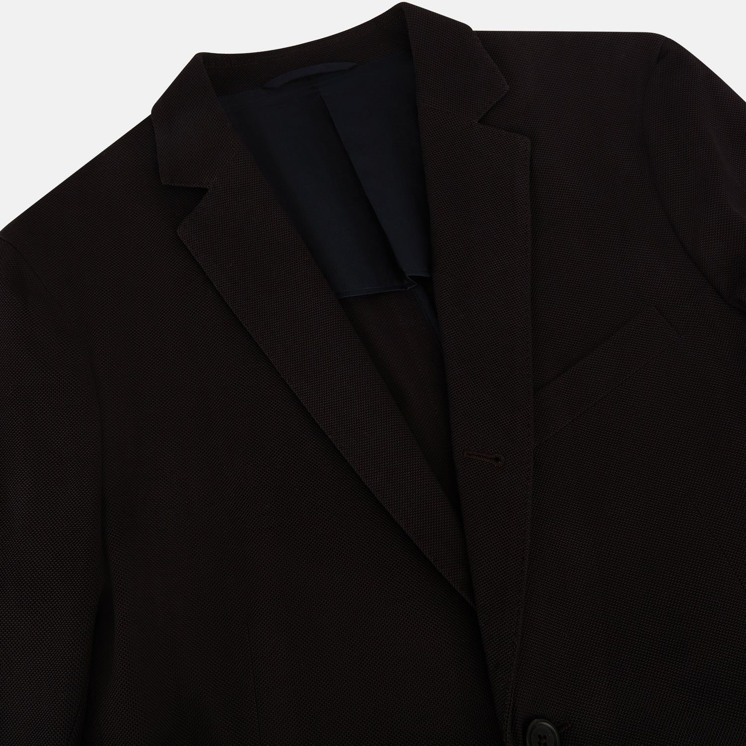 View 2 of product The Turnbull & Asser Dark Chocolate Knitted London Blazer features a notched lapel, two buttons, and two front pockets for versatile everyday wear. Shown against a plain white background.