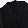 View 2 of product The Charcoal Knitted London Blazer by Turnbull & Asser is a men's single-breasted formal jacket with two buttons, notched lapels, and two front patch pockets, shown against a plain white background.