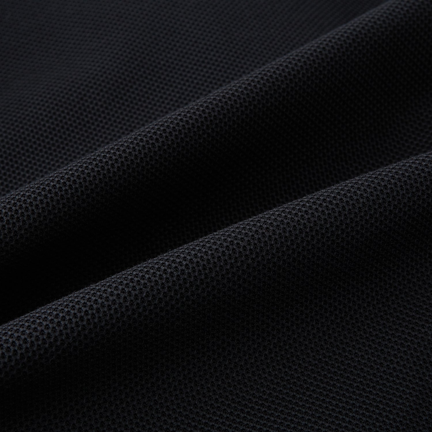 View 5 of product The Charcoal Knitted London Blazer by Turnbull & Asser is a men's single-breasted formal jacket with two buttons, notched lapels, and two front patch pockets, shown against a plain white background.