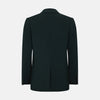 View 3 of product The Turnbull & Asser Forest Green Knitted London Blazer showcases notch lapels, two buttons, patch and chest pockets on a white background—a modern classic for timeless style.