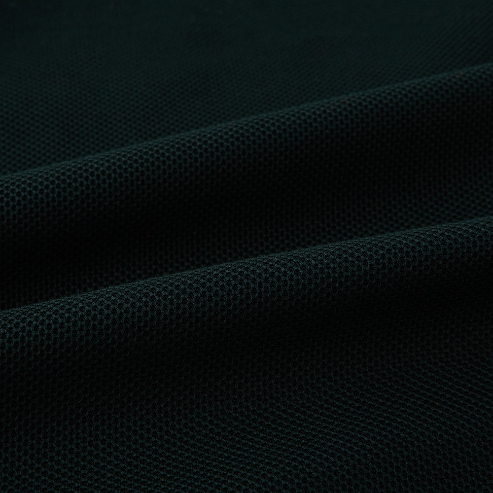 The Turnbull & Asser Forest Green Knitted London Blazer showcases notch lapels, two buttons, patch and chest pockets on a white background—a modern classic for timeless style.