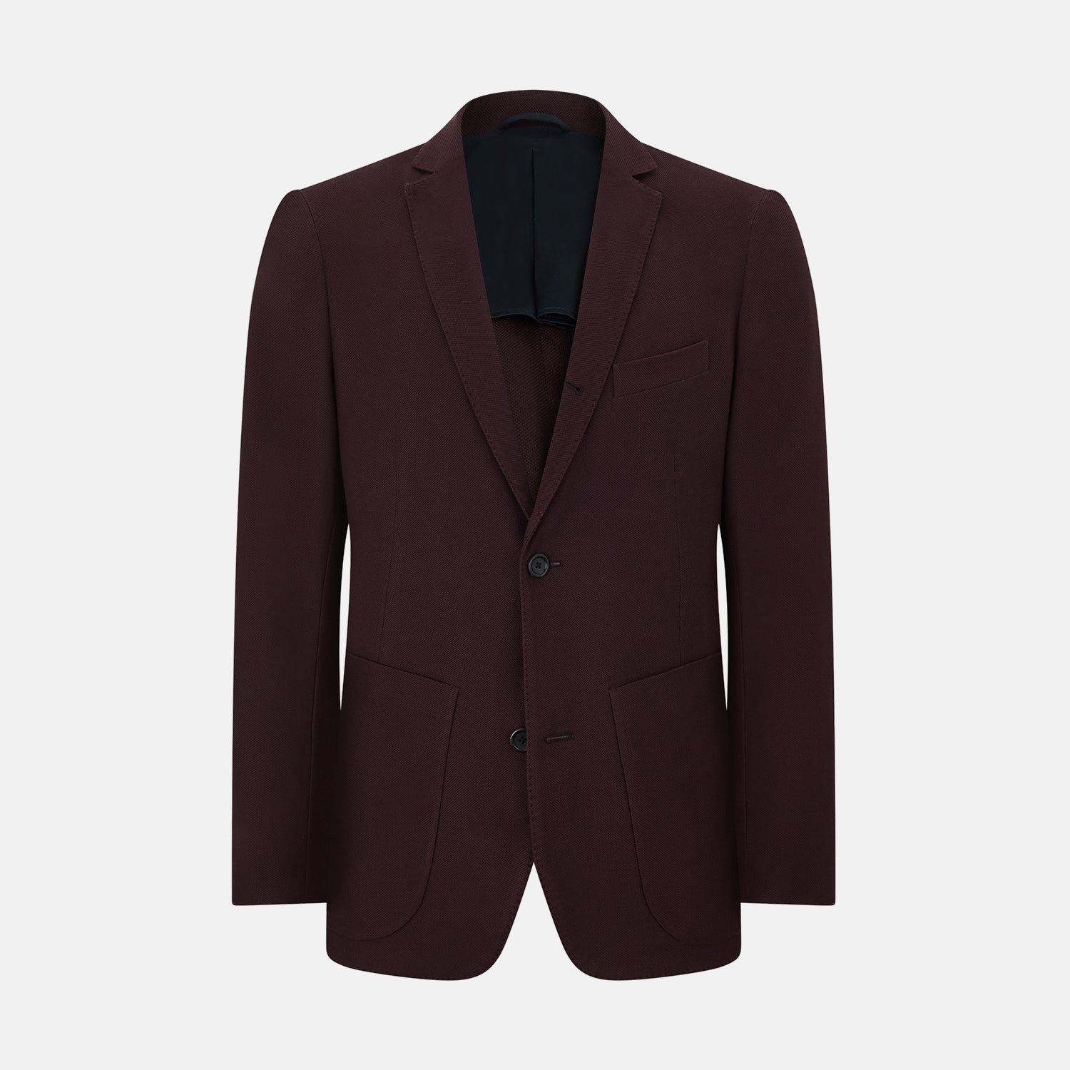 View 1 of product The Turnbull & Asser Burgundy Knitted London Blazer features notch lapels, two front buttons, flap pockets, and a welt chest pocket—ideal for spring and summer—shown against a plain white background.