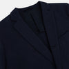 View 2 of product The Turnbull & Asser UK Navy Silk & Cotton Bath Blazer for men features notch lapels, two front pockets, a chest pocket, and a single-breasted button closure, crafted with refined Italian tailoring and shown on a white background.
