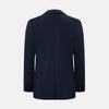 View 3 of product The Turnbull & Asser UK Navy Silk & Cotton Bath Blazer for men features notch lapels, two front pockets, a chest pocket, and a single-breasted button closure, crafted with refined Italian tailoring and shown on a white background.
