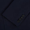 View 4 of product The Turnbull & Asser UK Navy Silk & Cotton Bath Blazer for men features notch lapels, two front pockets, a chest pocket, and a single-breasted button closure, crafted with refined Italian tailoring and shown on a white background.