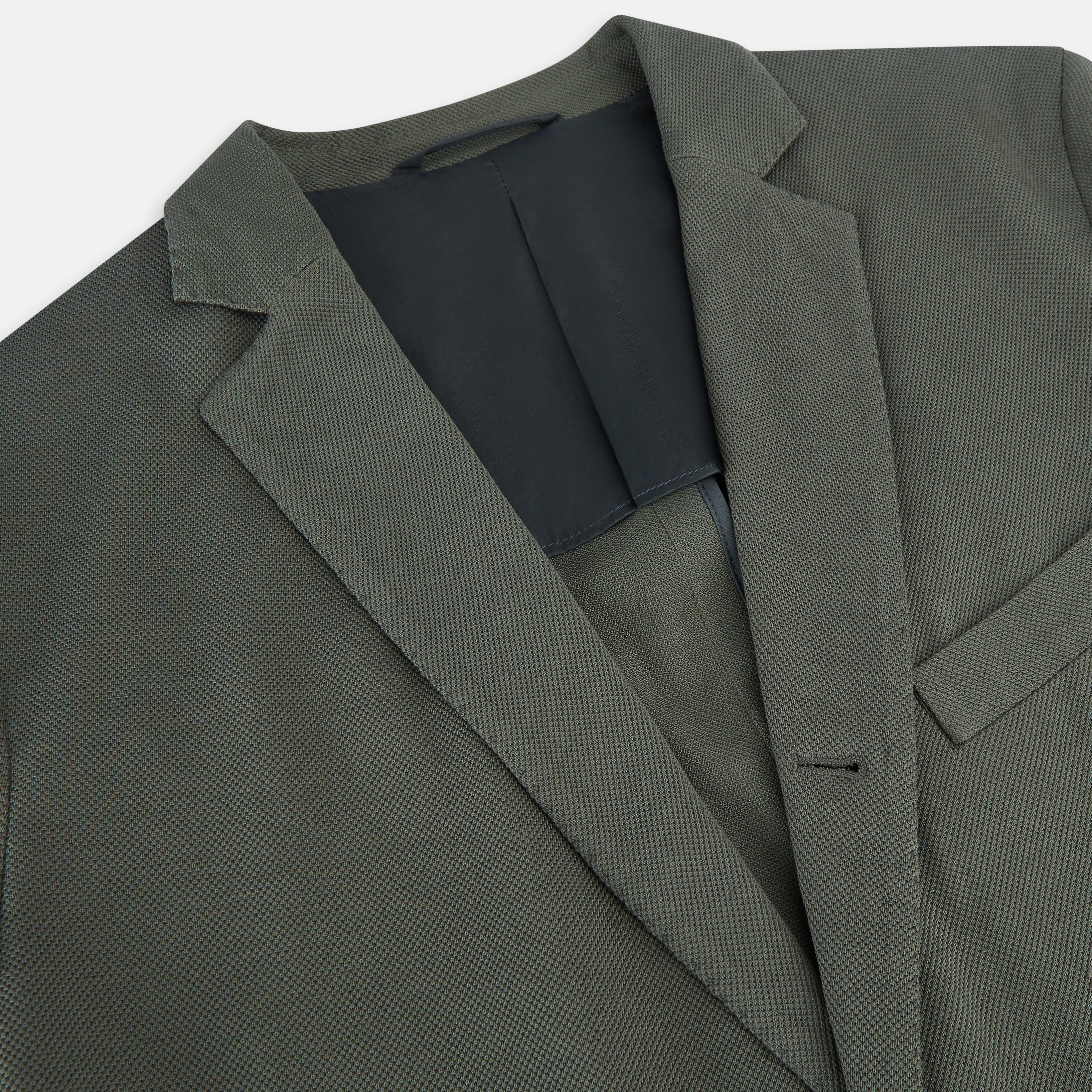 View 2 of product The Turnbull & Asser UK Sage Silk & Cotton Bath Blazer is a single-breasted Italian-tailored piece in olive green, featuring notch lapels, two front patch pockets, a chest pocket, and two buttons, shown on a plain white background.