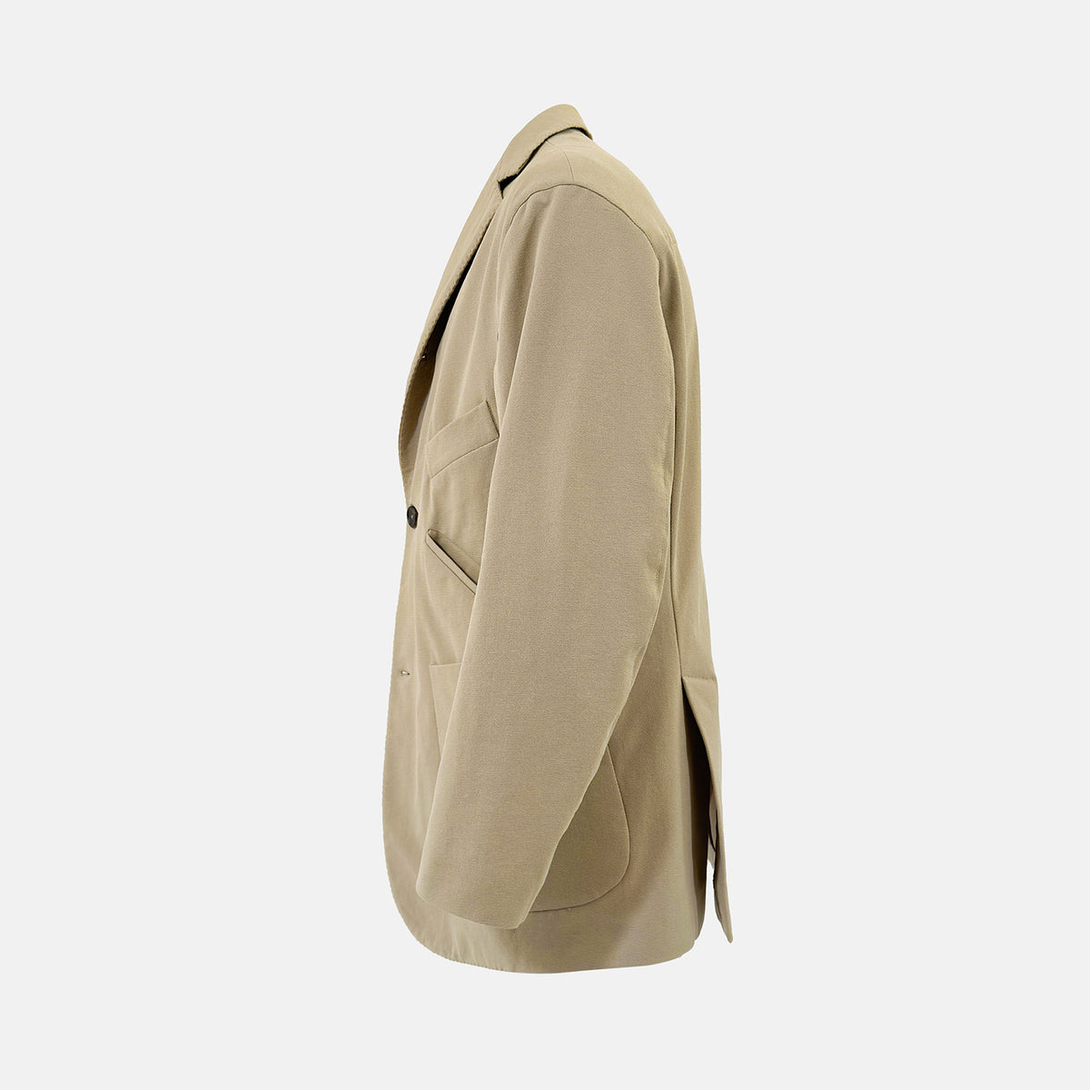 View 3 of product Riviera Sand Oversized Blazer in Cotton by Turnbull & Asser UK, featuring two spacious front pockets, a single chest pocket, and a classic notched lapel. Expertly tailored from premium cotton-nylon stretch fabric, this blazer is shown front-facing against a clean white background—an essential piece for achieving effortless sophistication.
