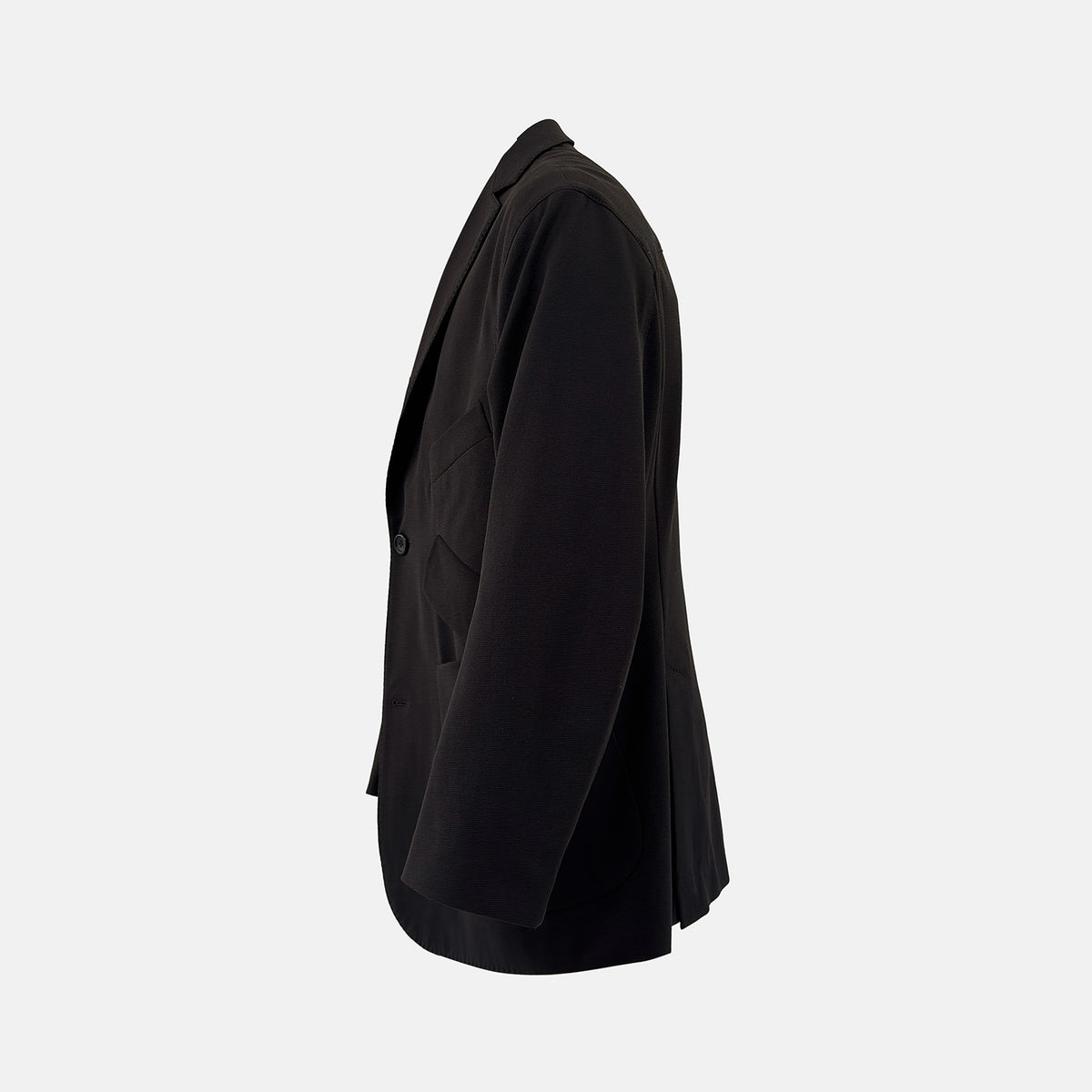 View 3 of product Introducing the Riviera Chocolate Oversized Blazer in Cotton by Turnbull & Asser UK—a dark brown blazer featuring two front buttons, three patch pockets, and notch lapels. Crafted from a cotton-nylon stretch fabric and showcased against a plain white background, this piece is a timeless addition to your autumn wardrobe.