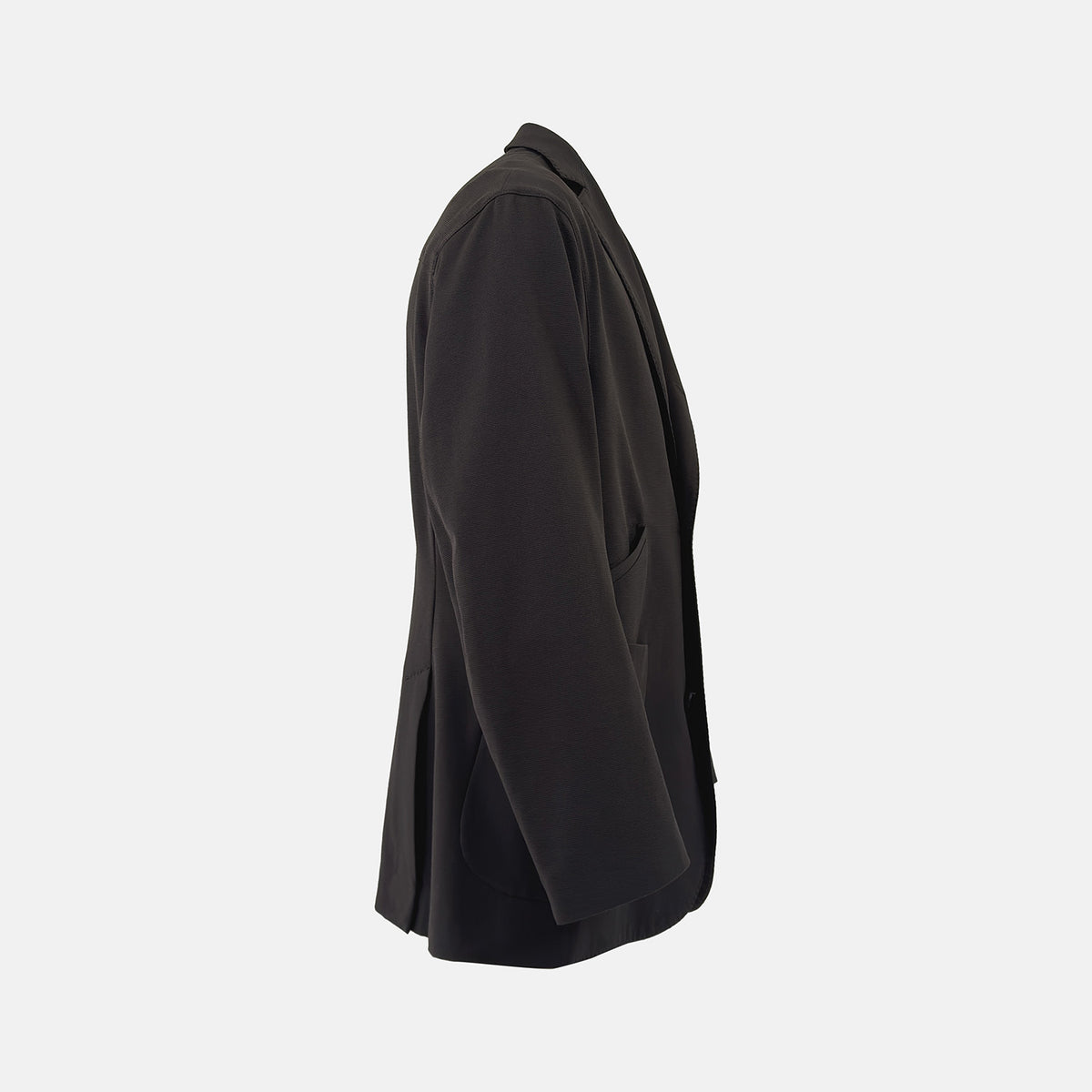 View 5 of product Introducing the Riviera Chocolate Oversized Blazer in Cotton by Turnbull & Asser UK—a dark brown blazer featuring two front buttons, three patch pockets, and notch lapels. Crafted from a cotton-nylon stretch fabric and showcased against a plain white background, this piece is a timeless addition to your autumn wardrobe.