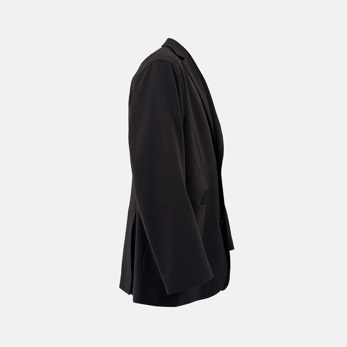 View 6 of product Introducing the Riviera Chocolate Oversized Blazer in Cotton by Turnbull & Asser UK—a dark brown blazer featuring two front buttons, three patch pockets, and notch lapels. Crafted from a cotton-nylon stretch fabric and showcased against a plain white background, this piece is a timeless addition to your autumn wardrobe.