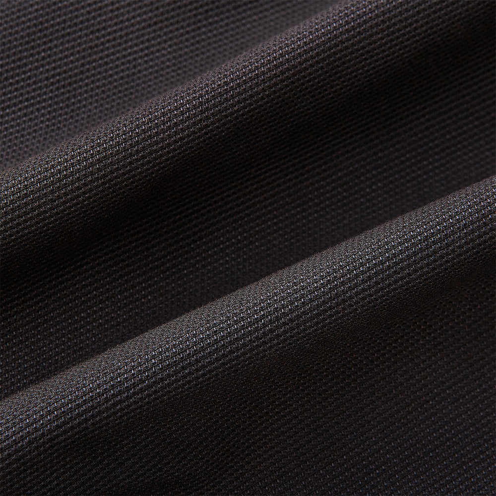 Introducing the Riviera Chocolate Oversized Blazer in Cotton by Turnbull & Asser UK—a dark brown blazer featuring two front buttons, three patch pockets, and notch lapels. Crafted from a cotton-nylon stretch fabric and showcased against a plain white background, this piece is a timeless addition to your autumn wardrobe.