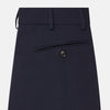 View 4 of product The Navy Blue James Trouser by Turnbull & Asser features a tailored straight-leg cut, flat front, belt loops, and button closure, shown on a plain white background for an elegant and versatile look.
