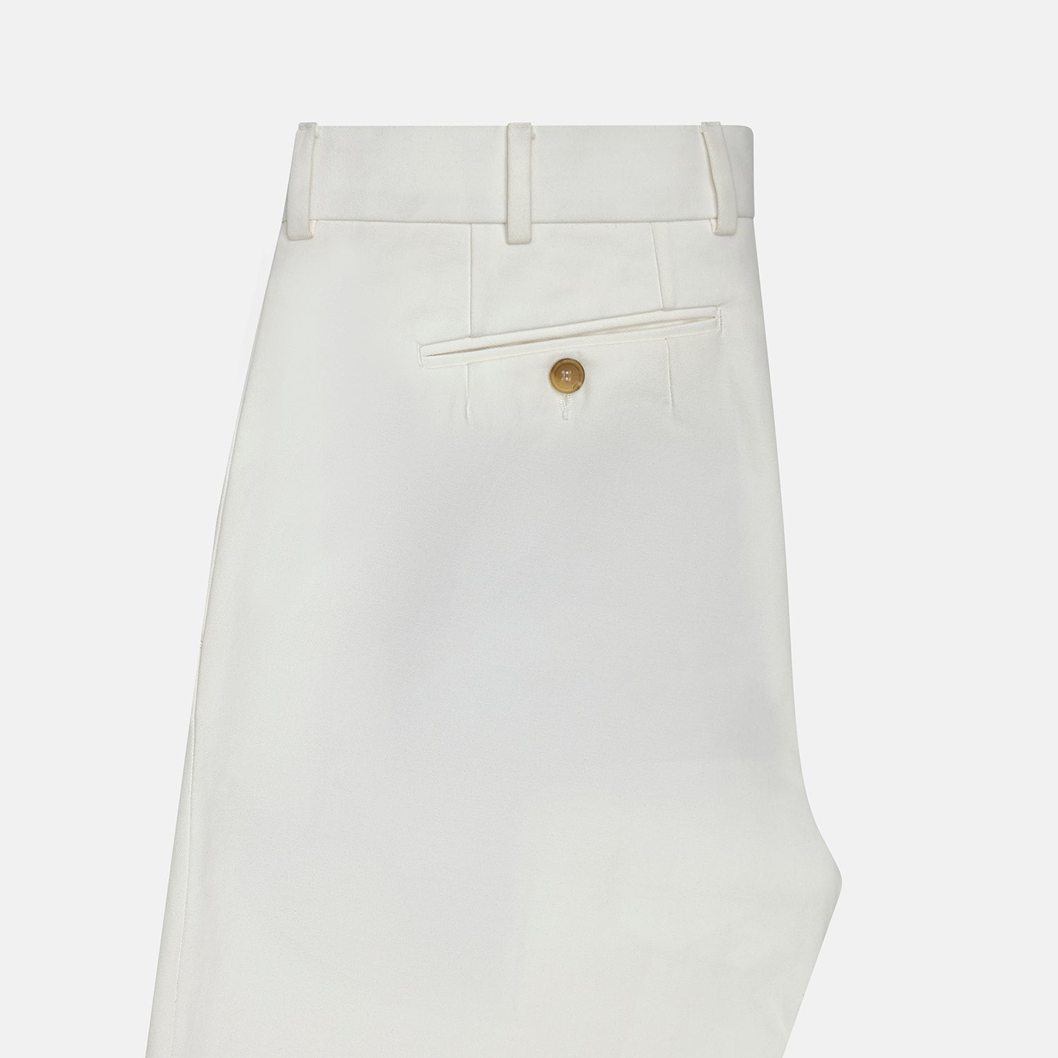 View 4 of product The Off White James Trouser by Turnbull & Asser is a straight fit pair with belt loops and side pockets, crafted from Italian cotton, shown against a plain light background.