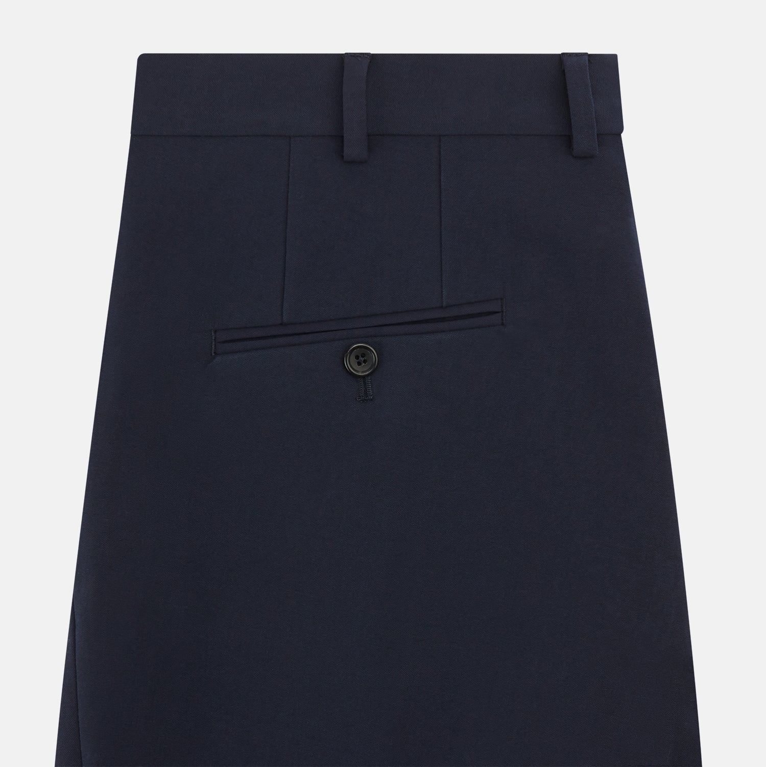 View 4 of product Turnbull & Asser Navy George Trousers in a cotton blend with a single pleat, button and zipper closure, belt loops, and crease detailing down each leg, shown on a plain white background.