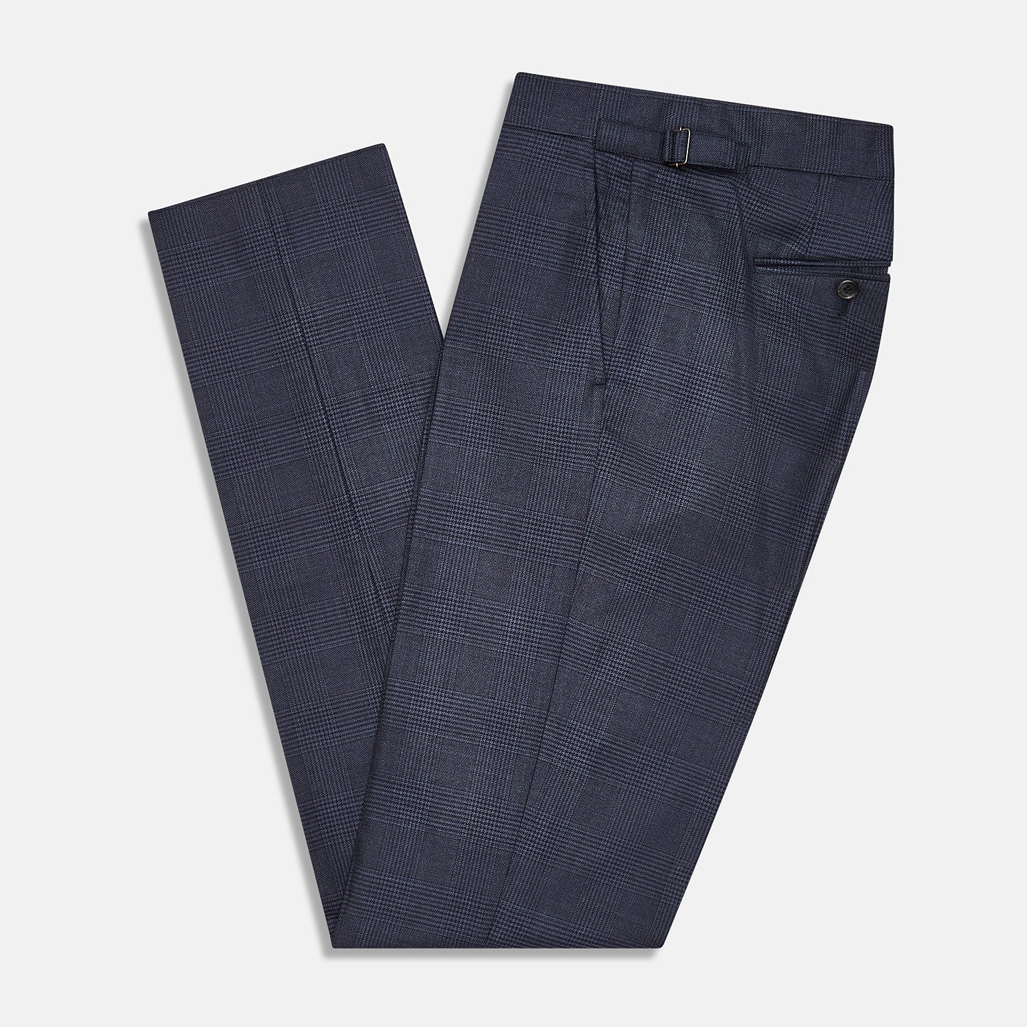 View 5 of product The Navy Check Henry Trousers by Turnbull & Asser are tailored-fit, dark blue pants with a subtle check pattern, front pockets, button closure, and belt loops, crafted from premium Italian wool and displayed on a plain white background.